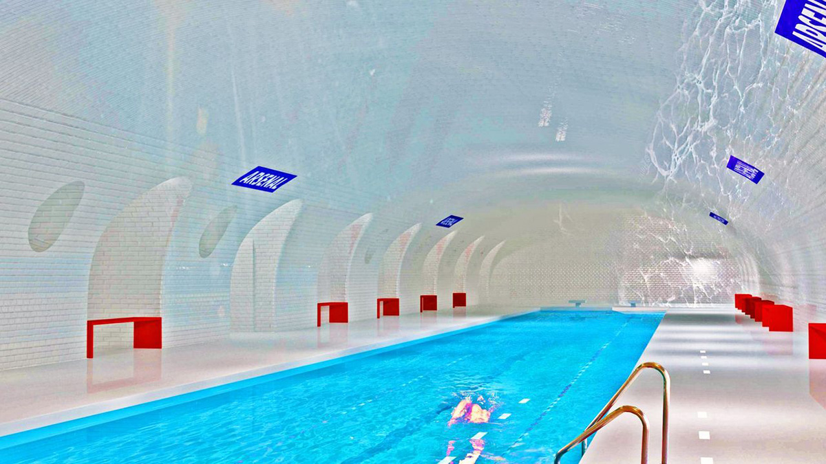 Arsenal station reimagined as a swimming pool.